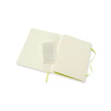 Бележник Moleskine XL с мека корица в черен цвят, отворен на празна страница