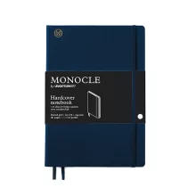 С твърди или меки корици от фина ленена материя, златно фолио с логото на MONOCLE