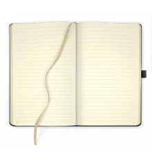 Компактен тефтер с меко, но устойчиво покритие за ежедневна употреба.